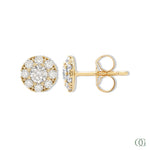 A pair of sparkling round diamond earrings with a gold band and smaller round diamonds set within.